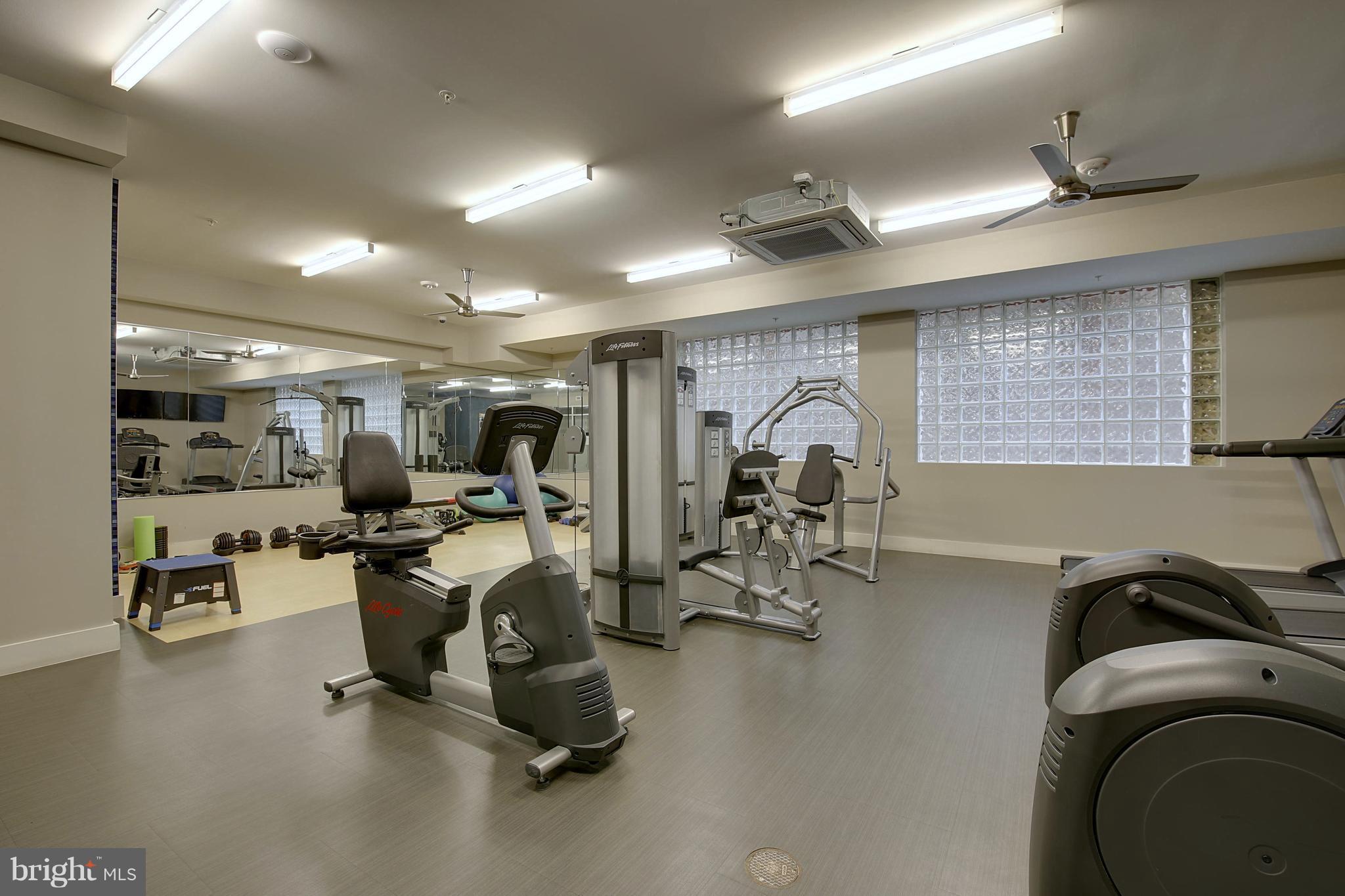 1320 Fenwick Lane, Unit 508 Silver Spring, MD 20910 - Photo 36 of 47 a view of a room with gym equipment