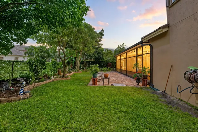 a view of a backyard with a garden