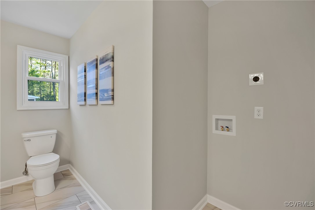 11202 Heathstead Road Chester, VA 23831 - Photo 19 of 50 Laundry room featuring electric dryer hookup, wash