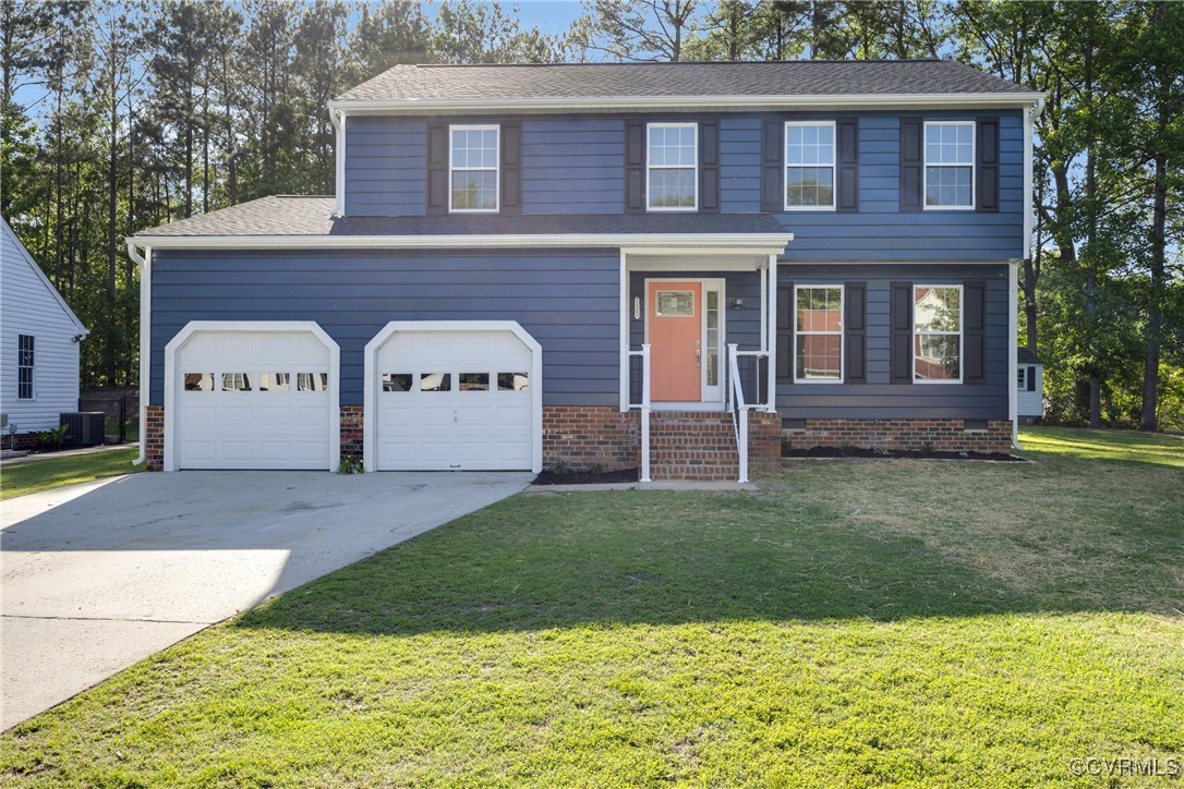 11202 Heathstead Road Chester, VA 23831 - Photo 2 of 50 View of front of property with concrete driveway,