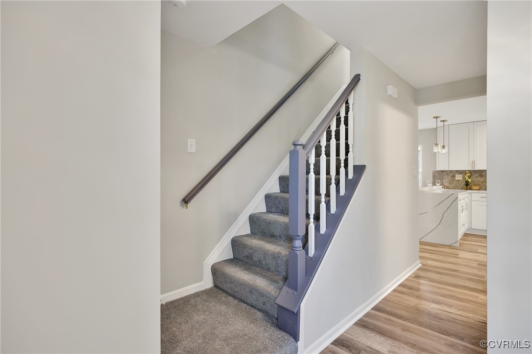 11202 Heathstead Road Chester, VA 23831 - Photo 21 of 50 Stairway featuring baseboards and wood finished fl