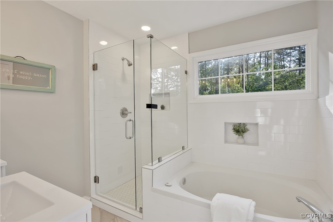 11202 Heathstead Road Chester, VA 23831 - Photo 24 of 50 Full bathroom with a shower stall, a garden tub, a