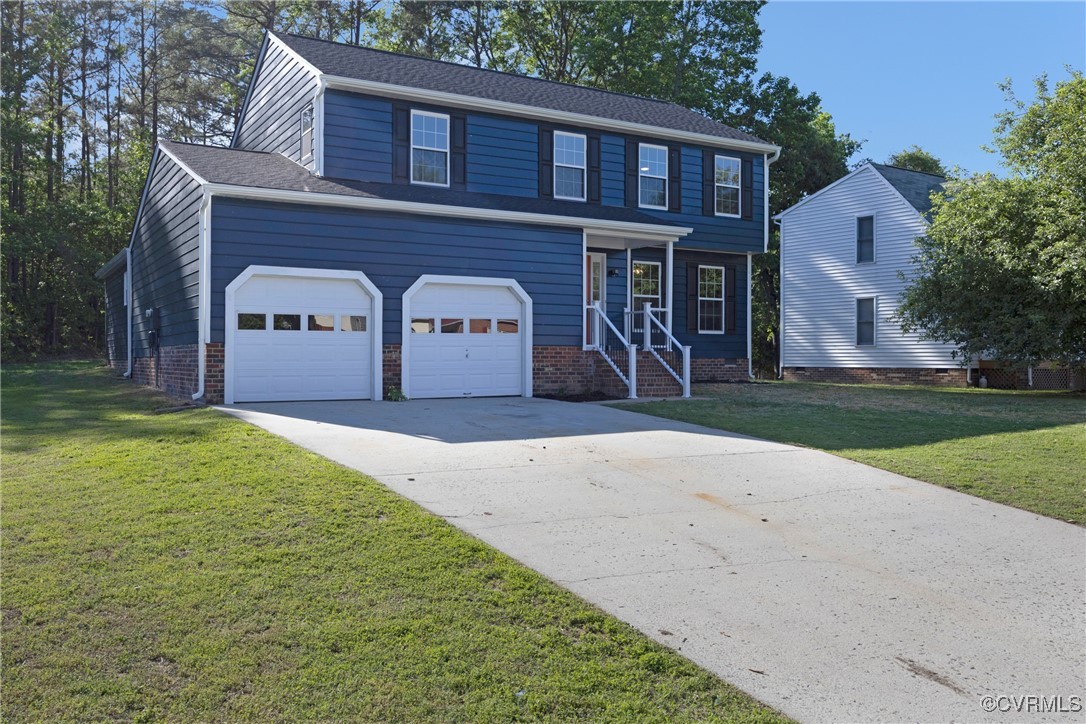 11202 Heathstead Road Chester, VA 23831 - Photo 3 of 50 Traditional-style house with a front yard and driv