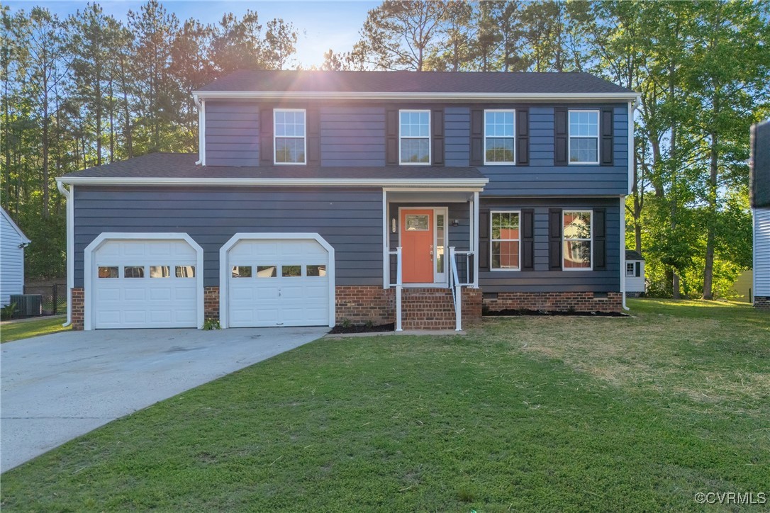11202 Heathstead Road Chester, VA 23831 - Photo 41 of 50 View of front facade with driveway, central air co