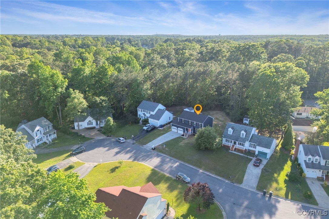 11202 Heathstead Road Chester, VA 23831 - Photo 43 of 50 Aerial view of residential area with a forest