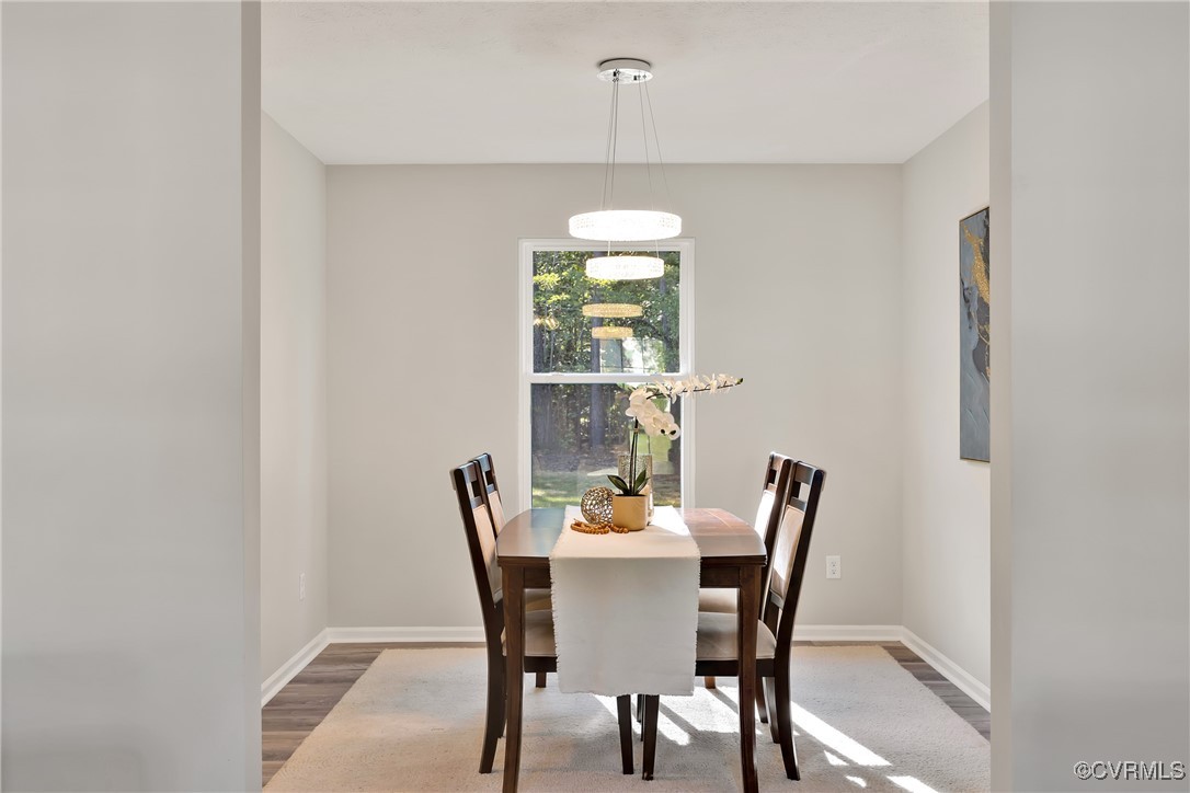 11202 Heathstead Road Chester, VA 23831 - Photo 8 of 50 Dining room with baseboards and wood finished floo