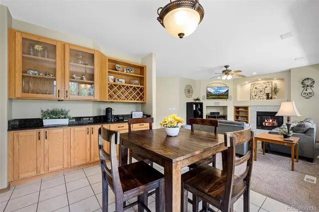 a dining room with furniture and window