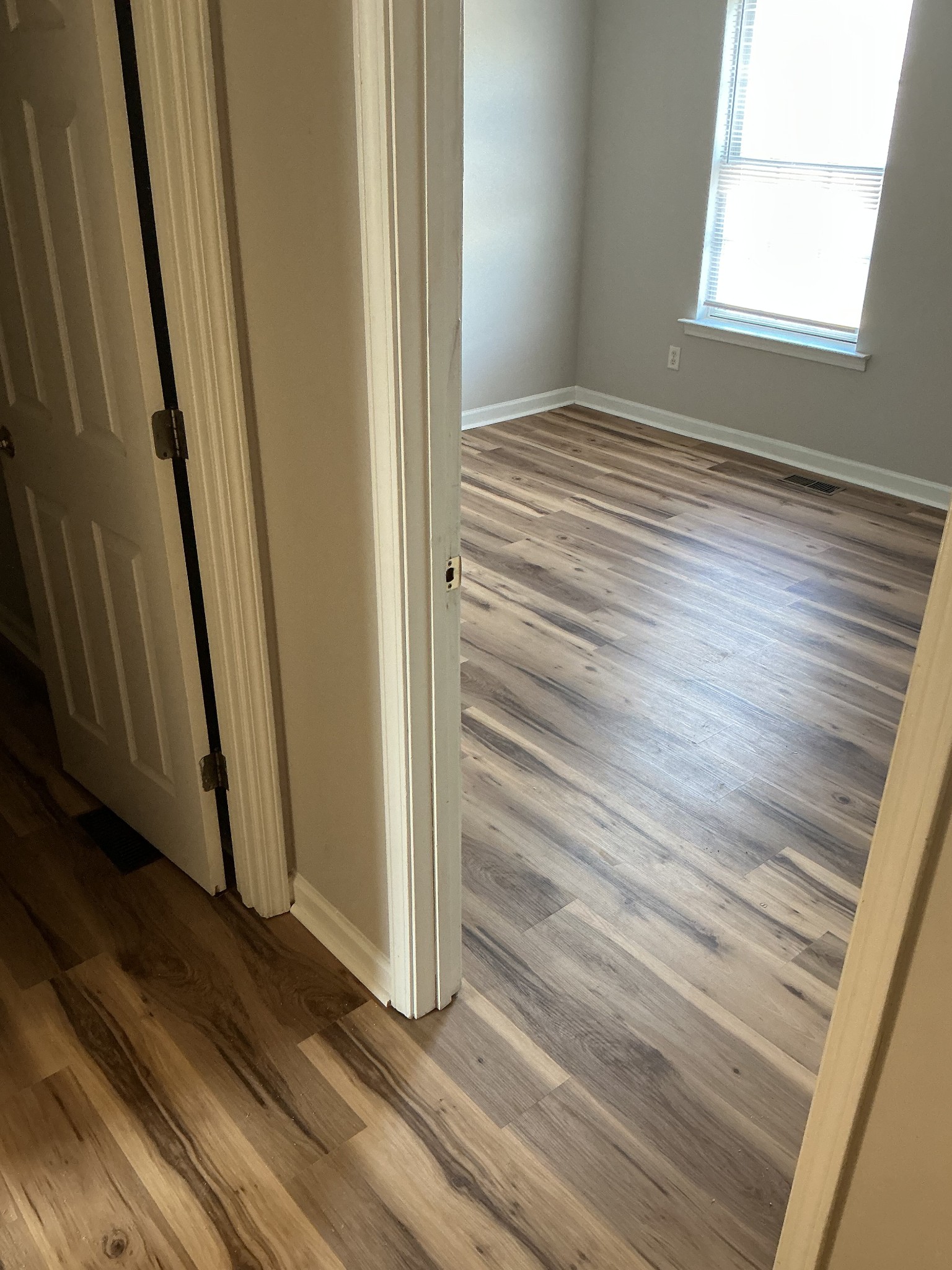 1431 Benley Street Murfreesboro, TN 37130 - Photo 5 of 8 a view of wooden floor and windows in a room