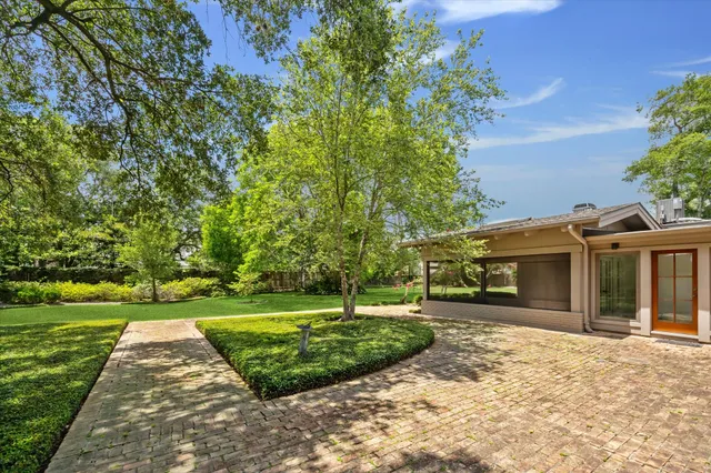a view of a house with a big yard