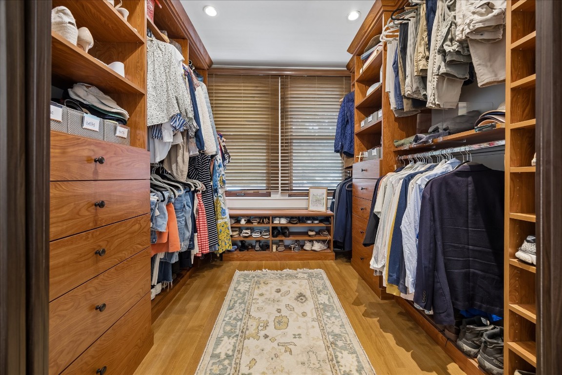 1705 Haver Street Houston, TX 77006 - Photo 15 of 31 Large Primary walk-in closet with hanging space and tons of shelving
