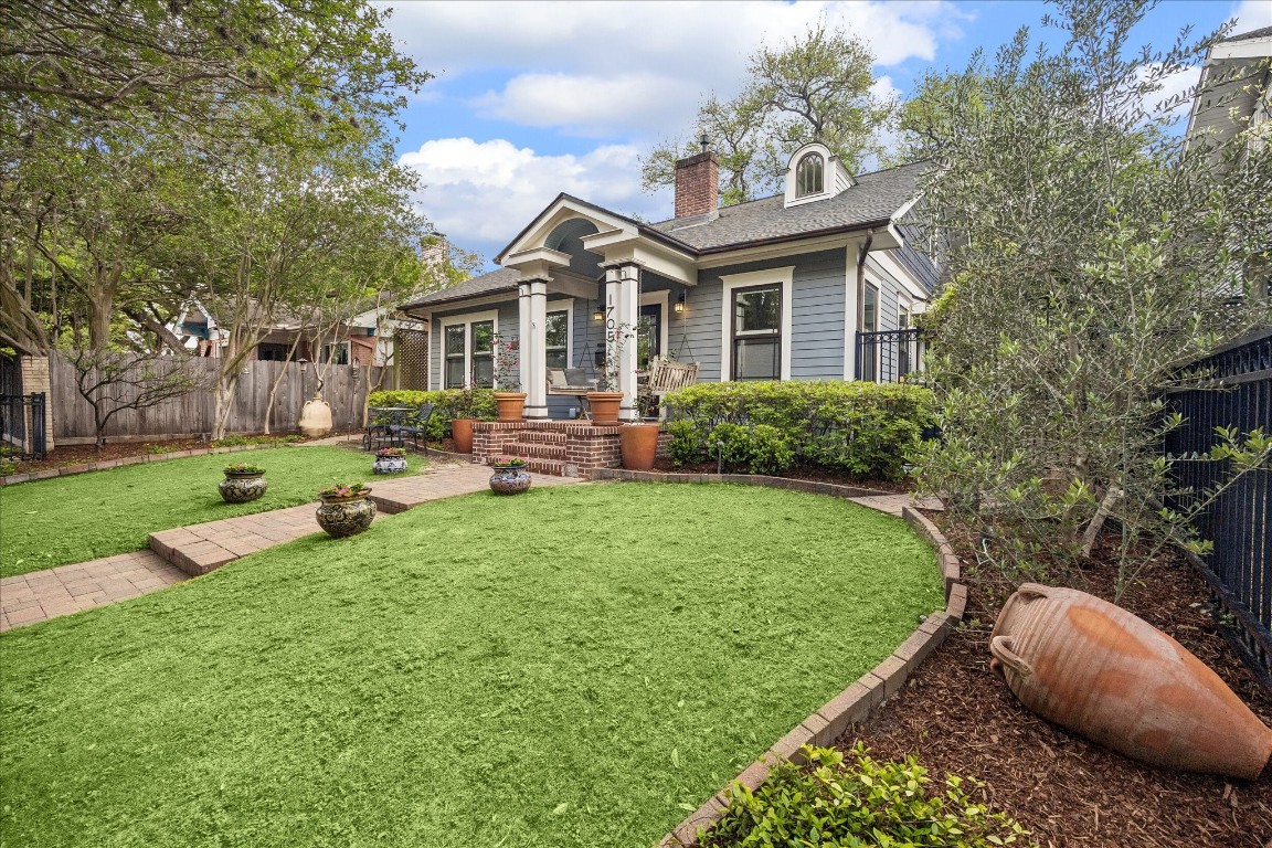 1705 Haver Street Houston, TX 77006 - Photo 2 of 31 Fully fenced Front Yard with new irrigation system (2025)