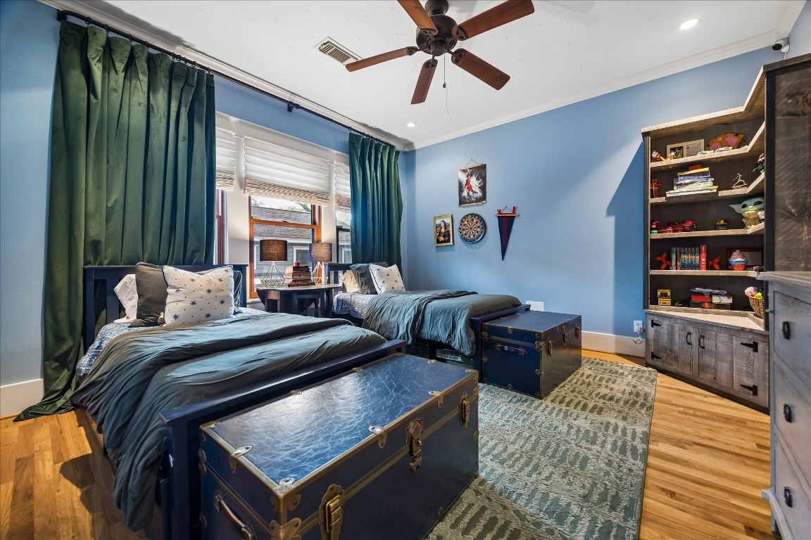 1705 Haver Street Houston, TX 77006 - Photo 21 of 31 Secondary Bedroom with walk-in closet and view of the Backyard