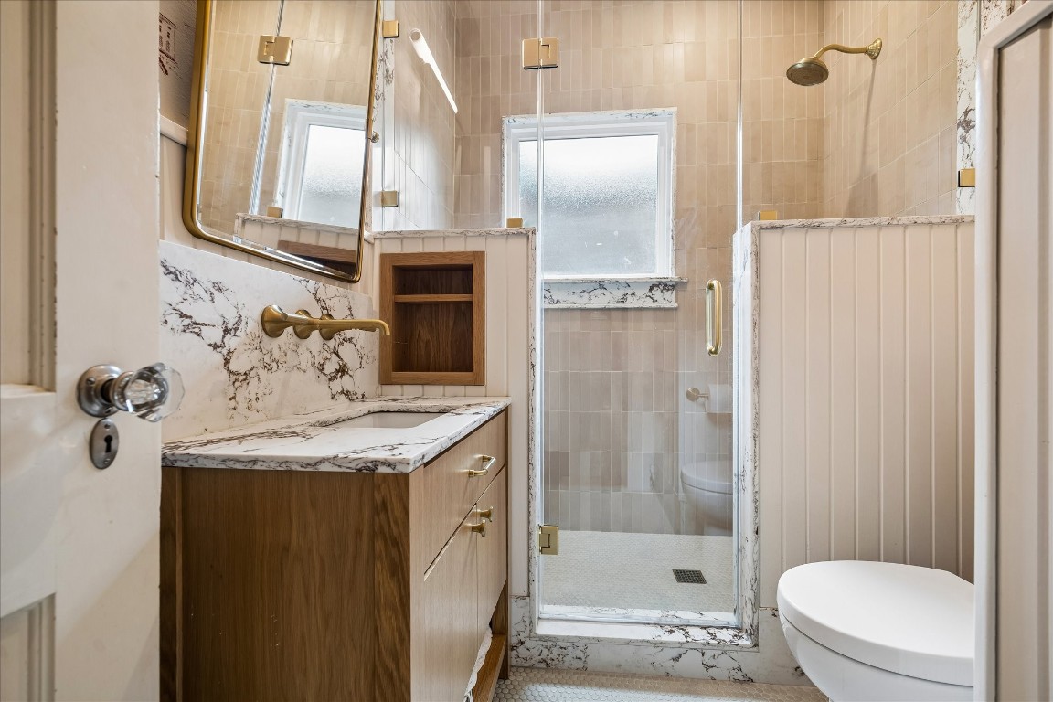 1705 Haver Street Houston, TX 77006 - Photo 22 of 31 Recently removated, this secondary bathroom is complete with designer finishes