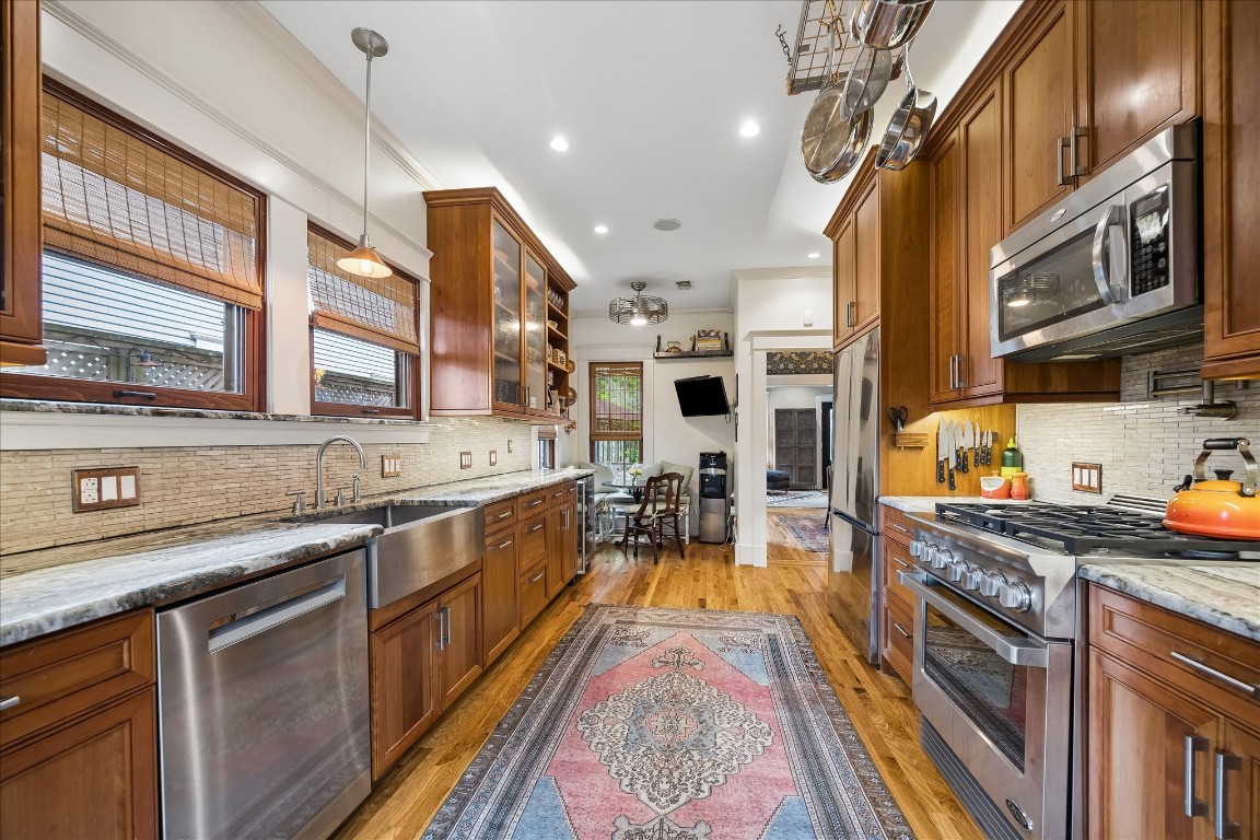 1705 Haver Street Houston, TX 77006 - Photo 8 of 31 Kitchen features stainless steel appliances, pot filler, and ample counter space!