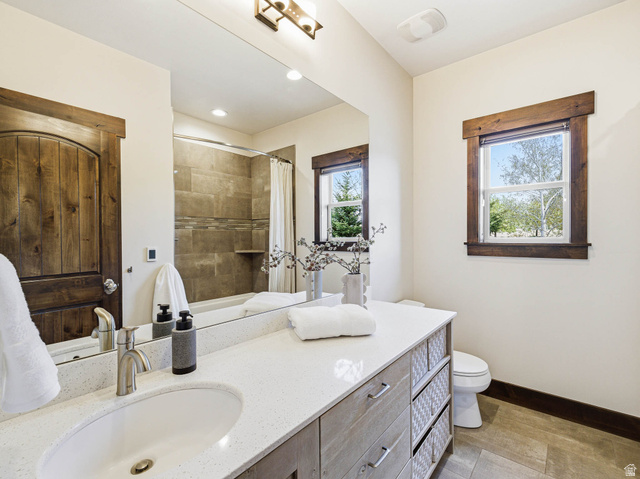 402 Shadow Hill Road Wanship, UT 84017 - Photo 34 of 90 Bathroom featuring vanity, curtained shower, and recessed lighting