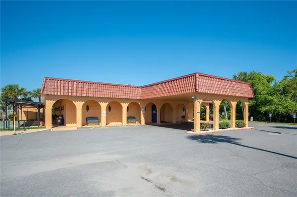 a view of front of house with a yard