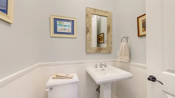a bathroom with a double vanity sink mirror and shower