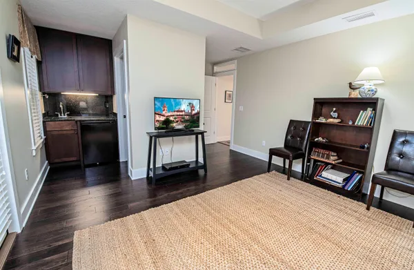 a children room with toys and a flat screen tv
