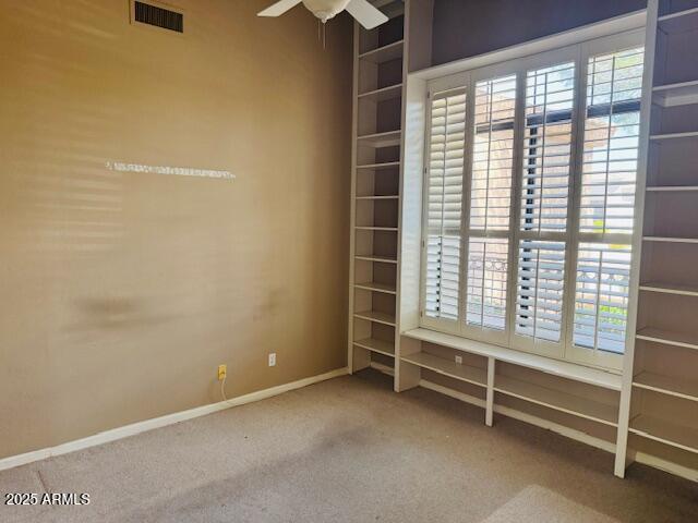 4843 East Estevan Road Phoenix, AZ 85054 - Photo 3 of 10 a view of an empty room with a window