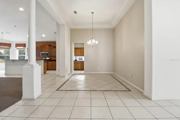 a view of a kitchen with granite countertop cabinets and window