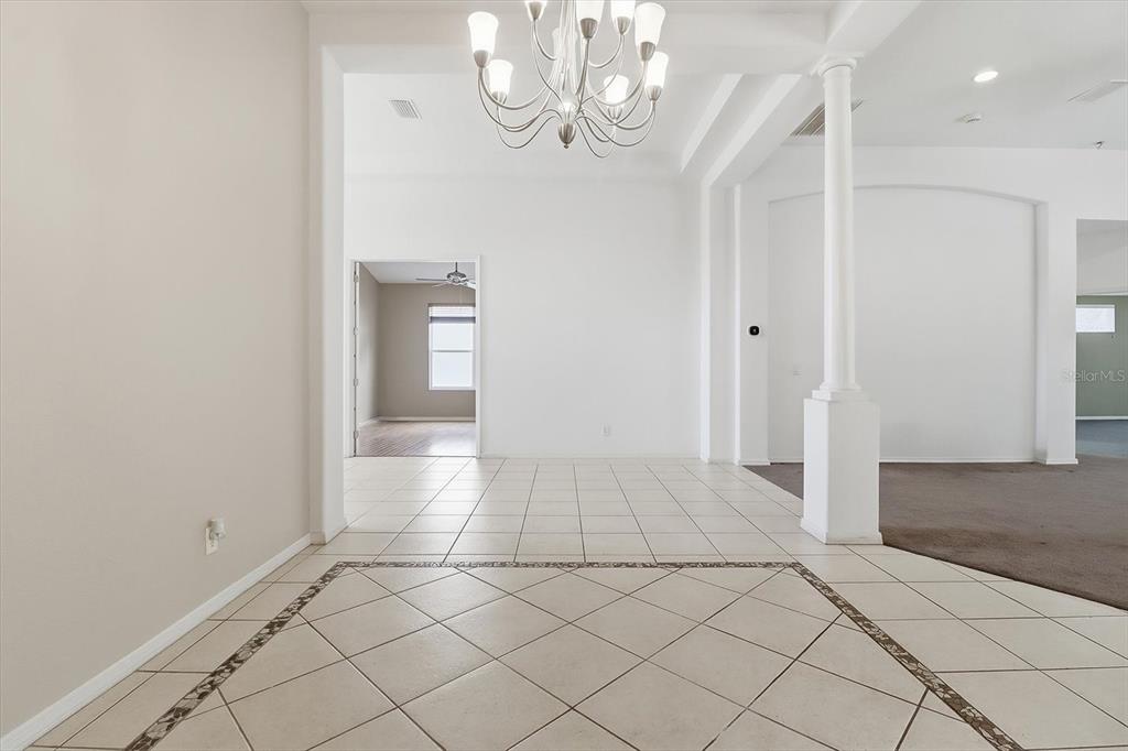 1683 North Shadowview Path Hernando, FL 34442 - Photo 13 of 56 en empty room with wooden floor