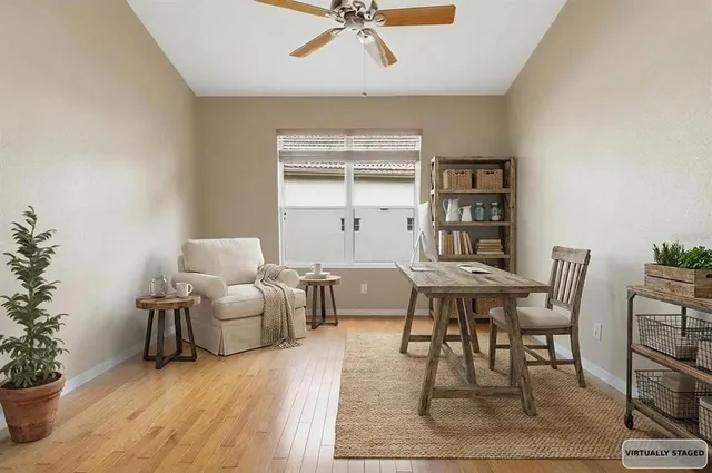 a bed room with a bed window and a dresser