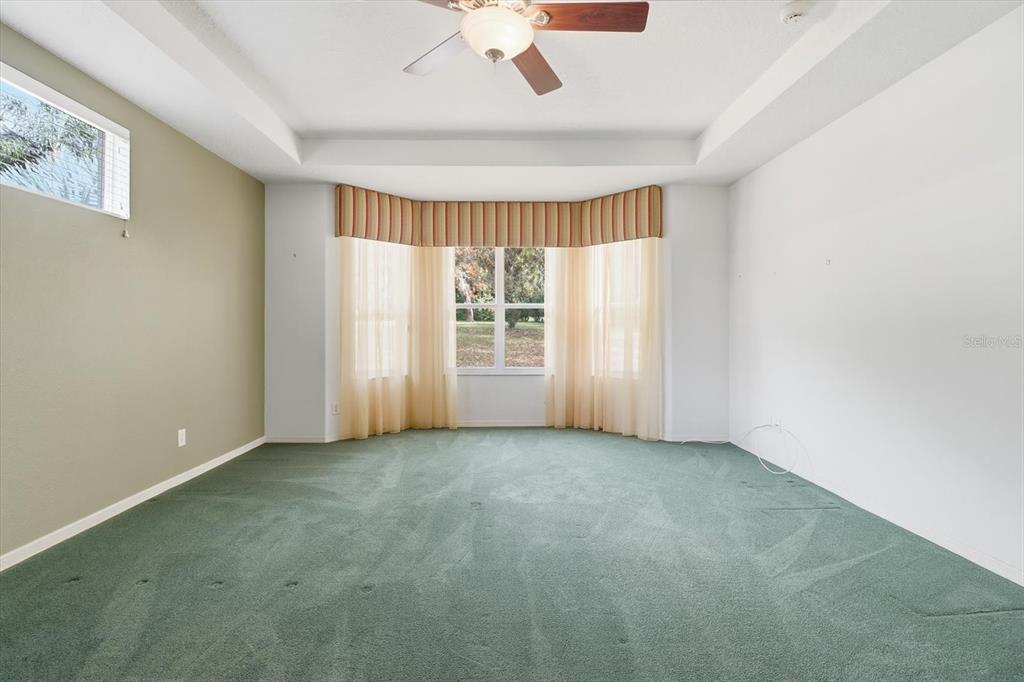 1683 North Shadowview Path Hernando, FL 34442 - Photo 31 of 56 an empty room with windows and closet