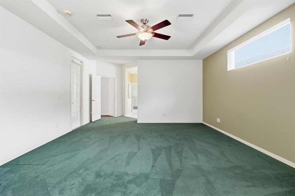 1683 North Shadowview Path Hernando, FL 34442 - Photo 33 of 56 an empty room with closet and a ceiling fan