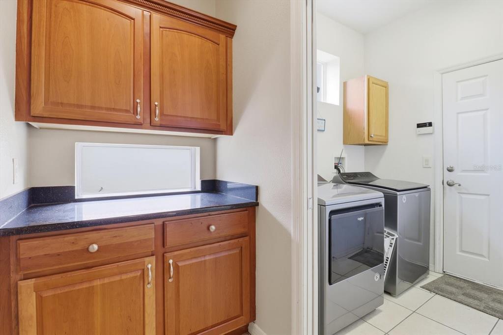 1683 North Shadowview Path Hernando, FL 34442 - Photo 38 of 56 a view of cabinets and wooden floor