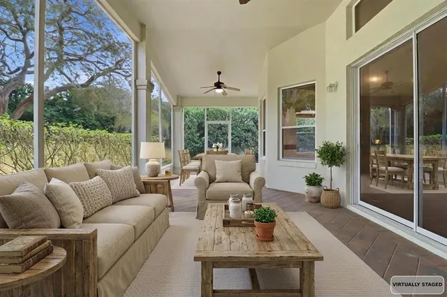 a front view of a house with a yard and porch