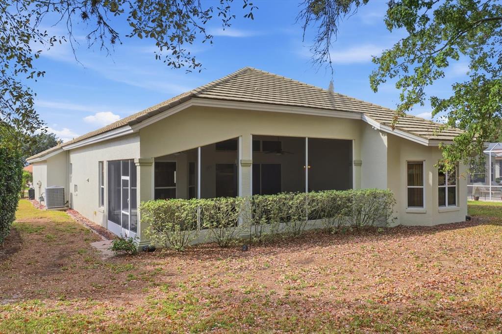 1683 North Shadowview Path Hernando, FL 34442 - Photo 42 of 56 a front view of a house with garden