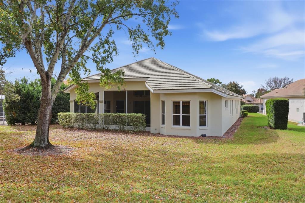 1683 North Shadowview Path Hernando, FL 34442 - Photo 43 of 56 a front view of a house with a yard and porch