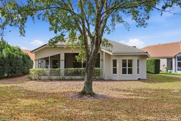 an aerial view of a house with outdoor space