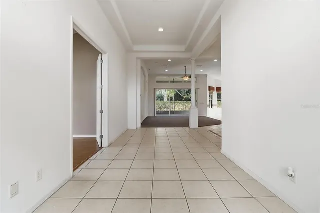 a view of an empty room and window