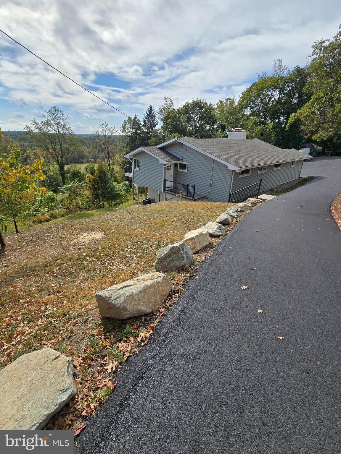 873 Ferry Road Doylestown, PA 18901 - Photo 3 of 38 a view of a house with a yard and street view