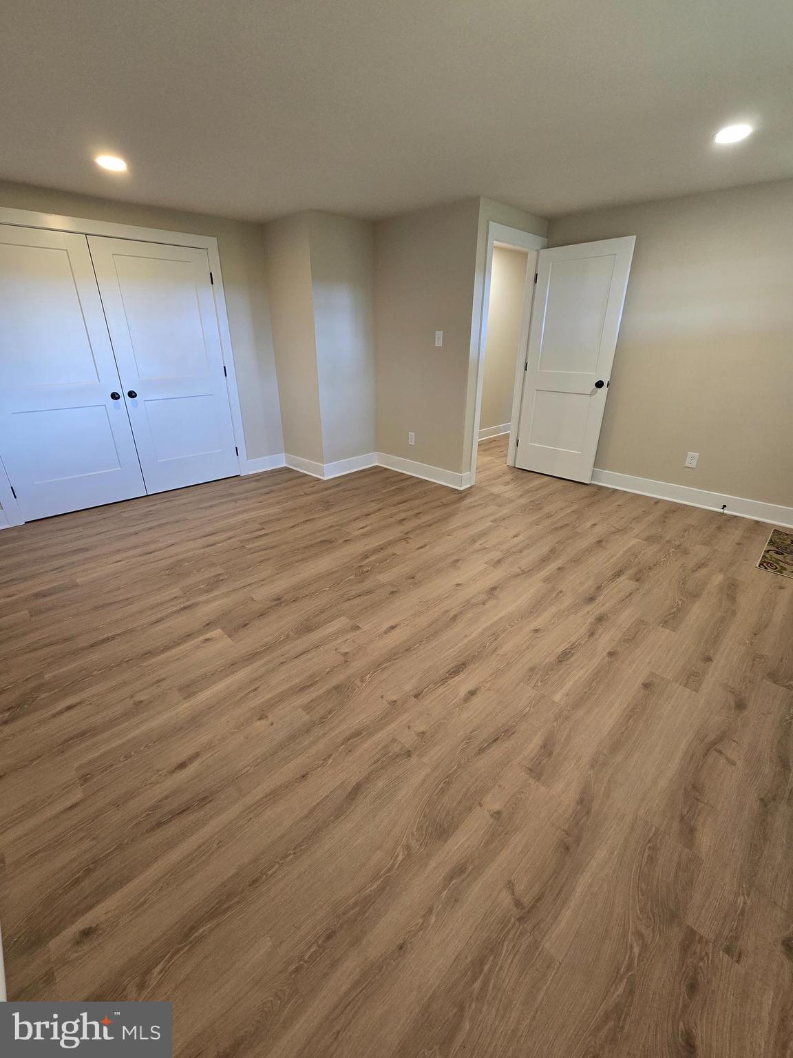 873 Ferry Road Doylestown, PA 18901 - Photo 31 of 38 an empty room with wooden floor