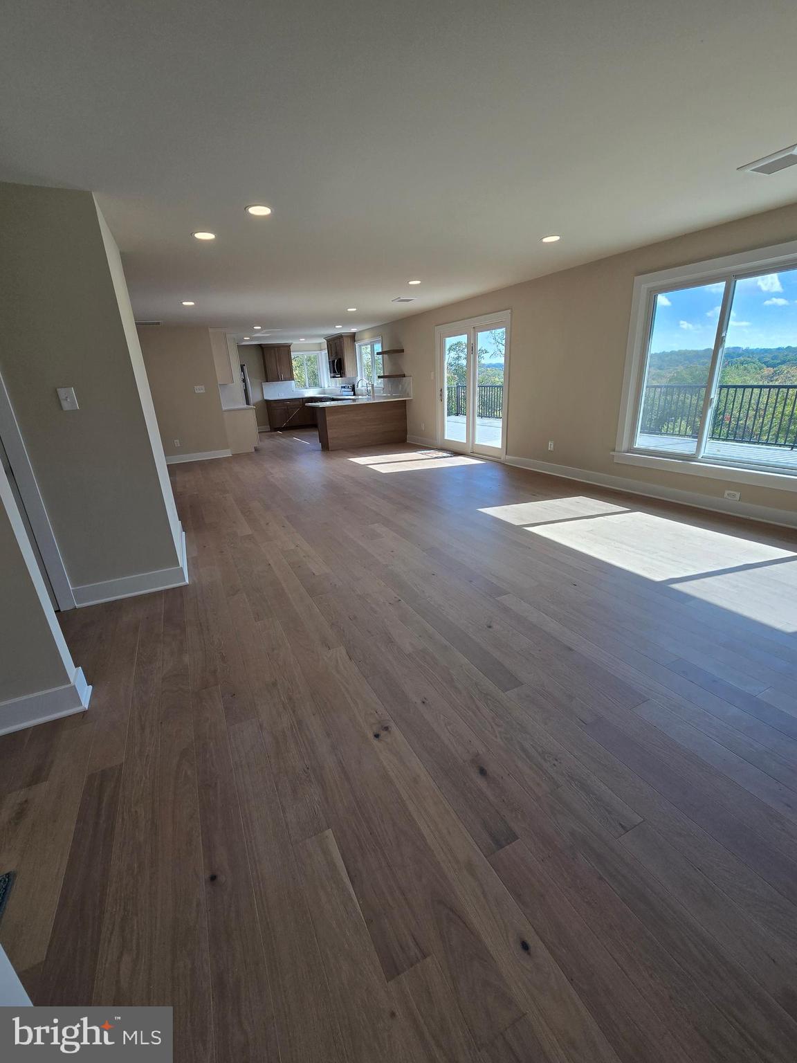 873 Ferry Road Doylestown, PA 18901 - Photo 8 of 38 an empty room with wooden floor and windows