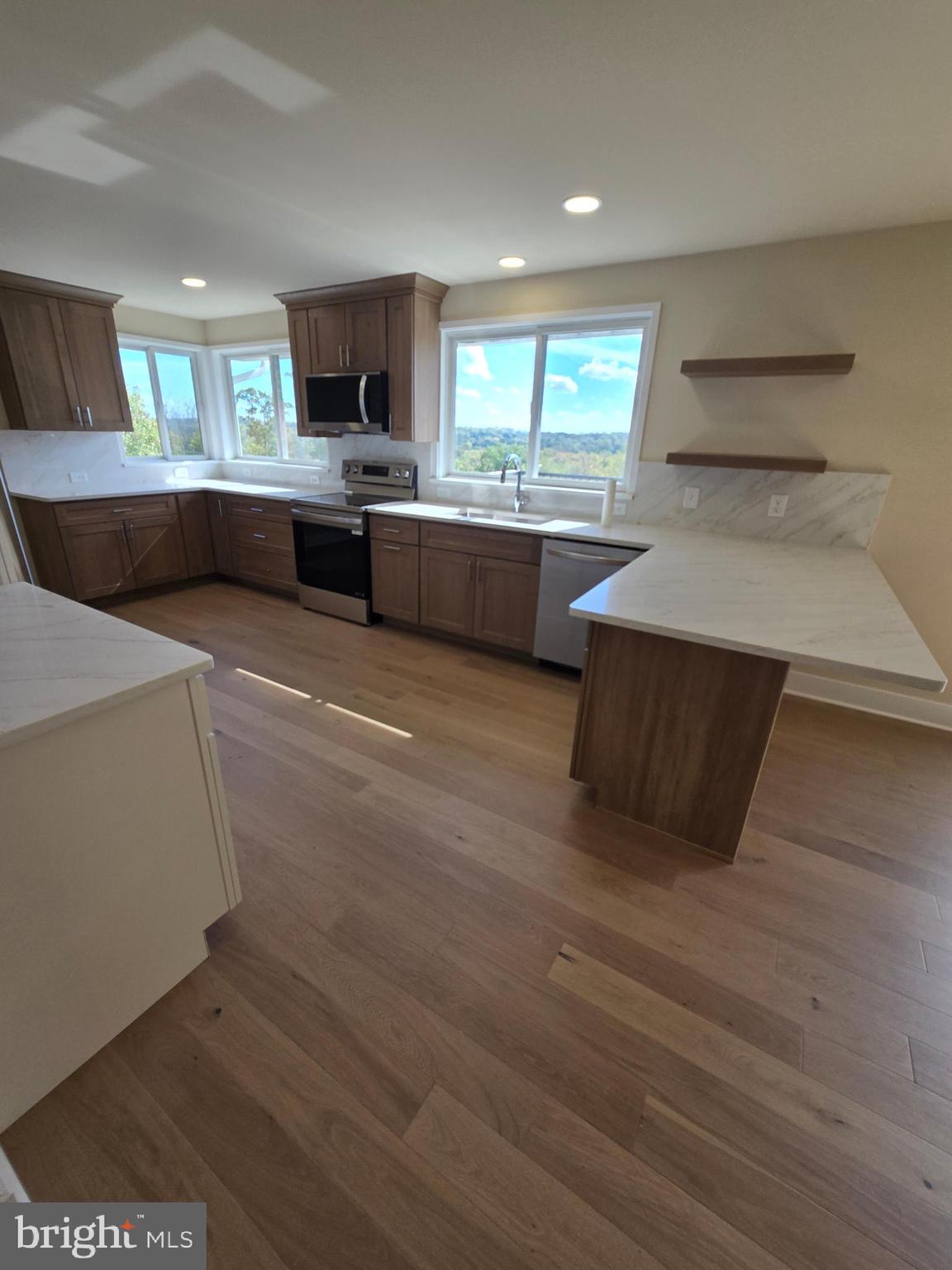873 Ferry Road Doylestown, PA 18901 - Photo 10 of 38 a view of kitchen with wooden floor and electronic appliances