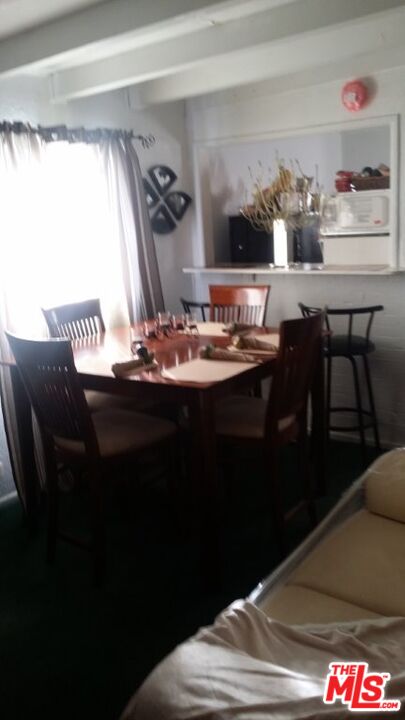 Fort Tejon Road Palmdale, CA 93552 - Photo 22 of 34 a room with a table chairs and entryway