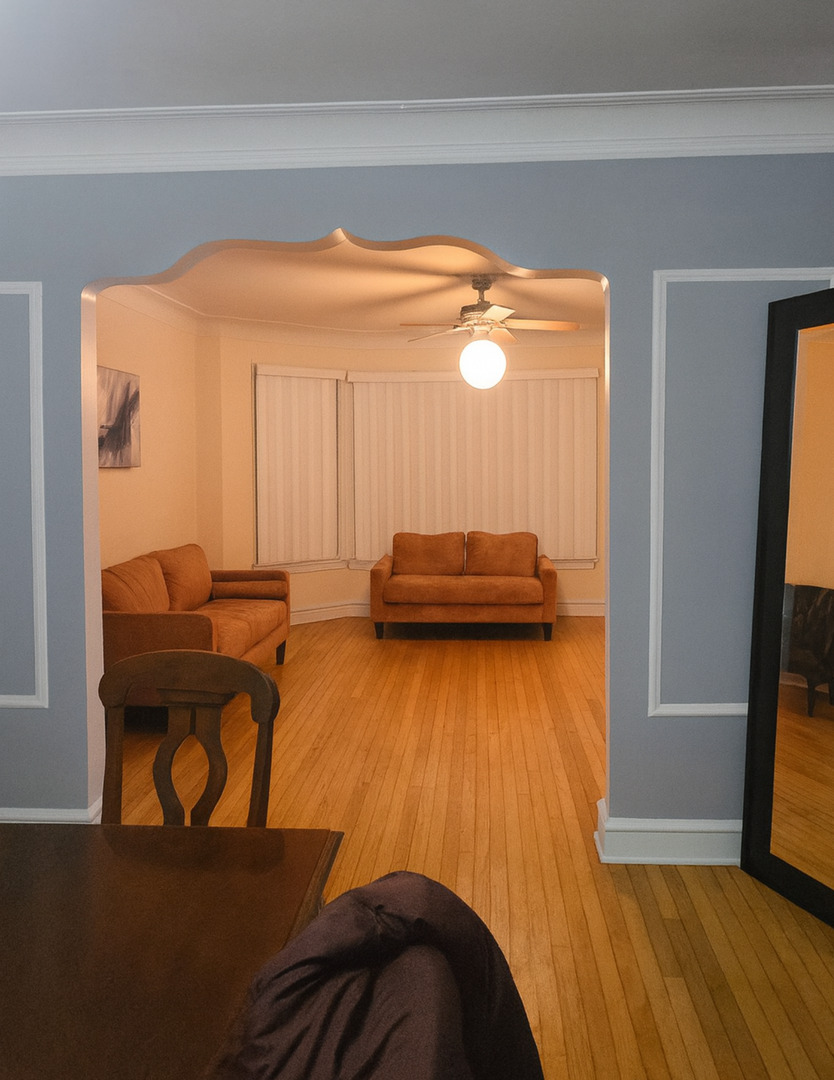 9919 South Charles Street Chicago, IL 60643 - Photo 2 of 19 a view of a bedroom with furniture and wooden floor