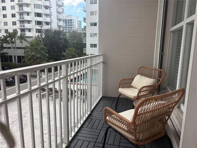 a view of a balcony with chair