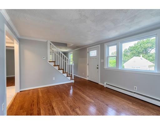 6 Robin Road Billerica, MA 01821 - Photo 4 of 26 a view interior of a house wooden floor and windows