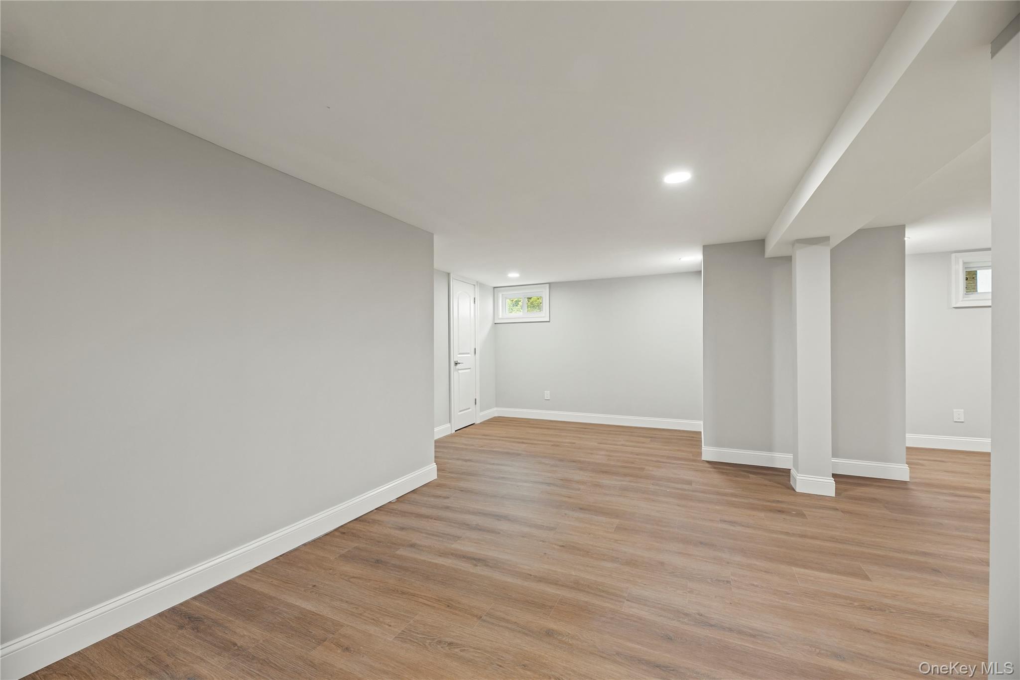 16 Eleanor Road Plainview, NY 11803 - Photo 22 of 28 Finished basement with wood-finish flooring, and recessed ceiling lighting