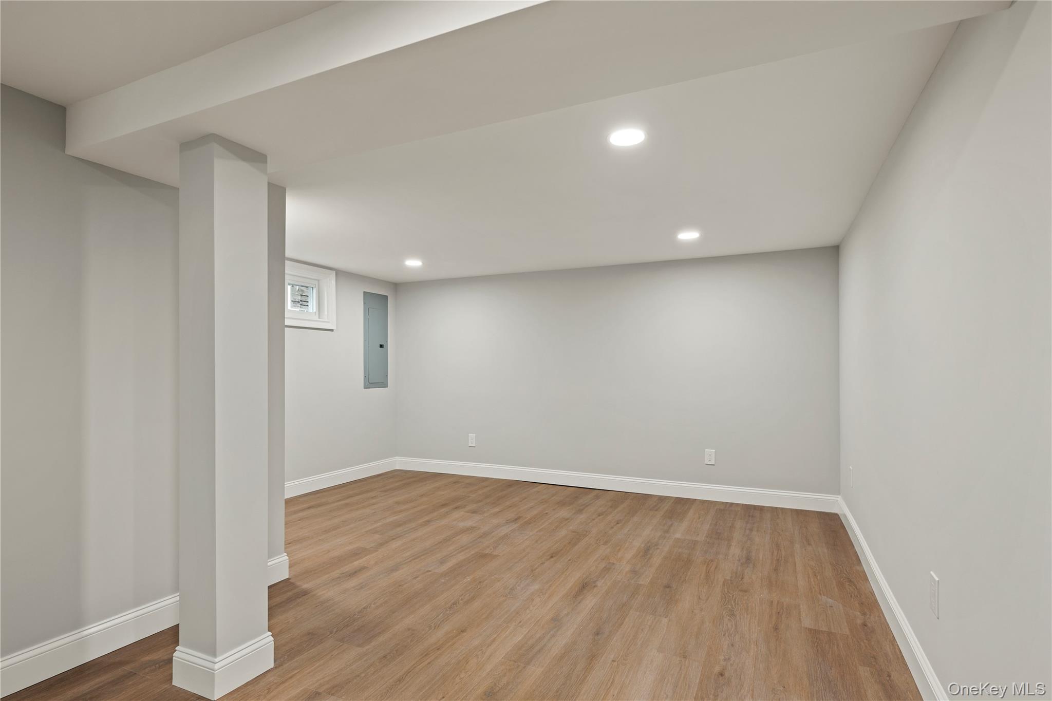 16 Eleanor Road Plainview, NY 11803 - Photo 23 of 28 Finished basement with wood-finish flooring, and recessed ceiling lighting
