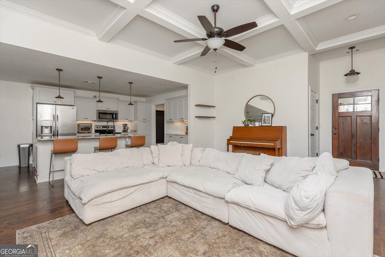 207 Kendall Court Perry, GA 31069 - Photo 11 of 45 a living room with furniture and kitchen view