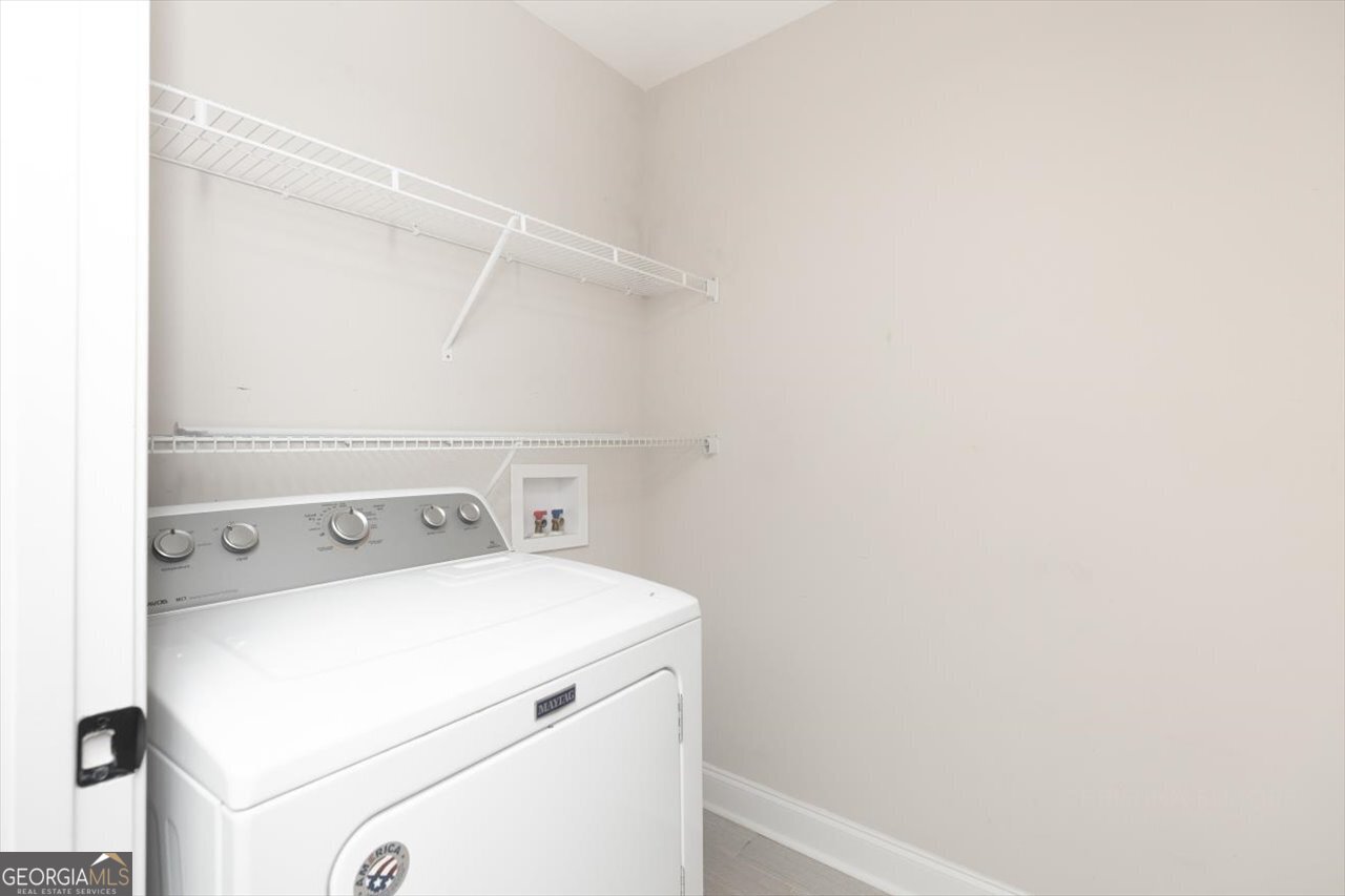 207 Kendall Court Perry, GA 31069 - Photo 22 of 45 a utility room with dryer and washer