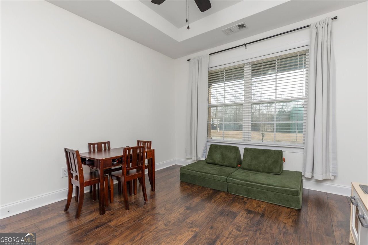 207 Kendall Court Perry, GA 31069 - Photo 30 of 45 a living room with furniture and a window