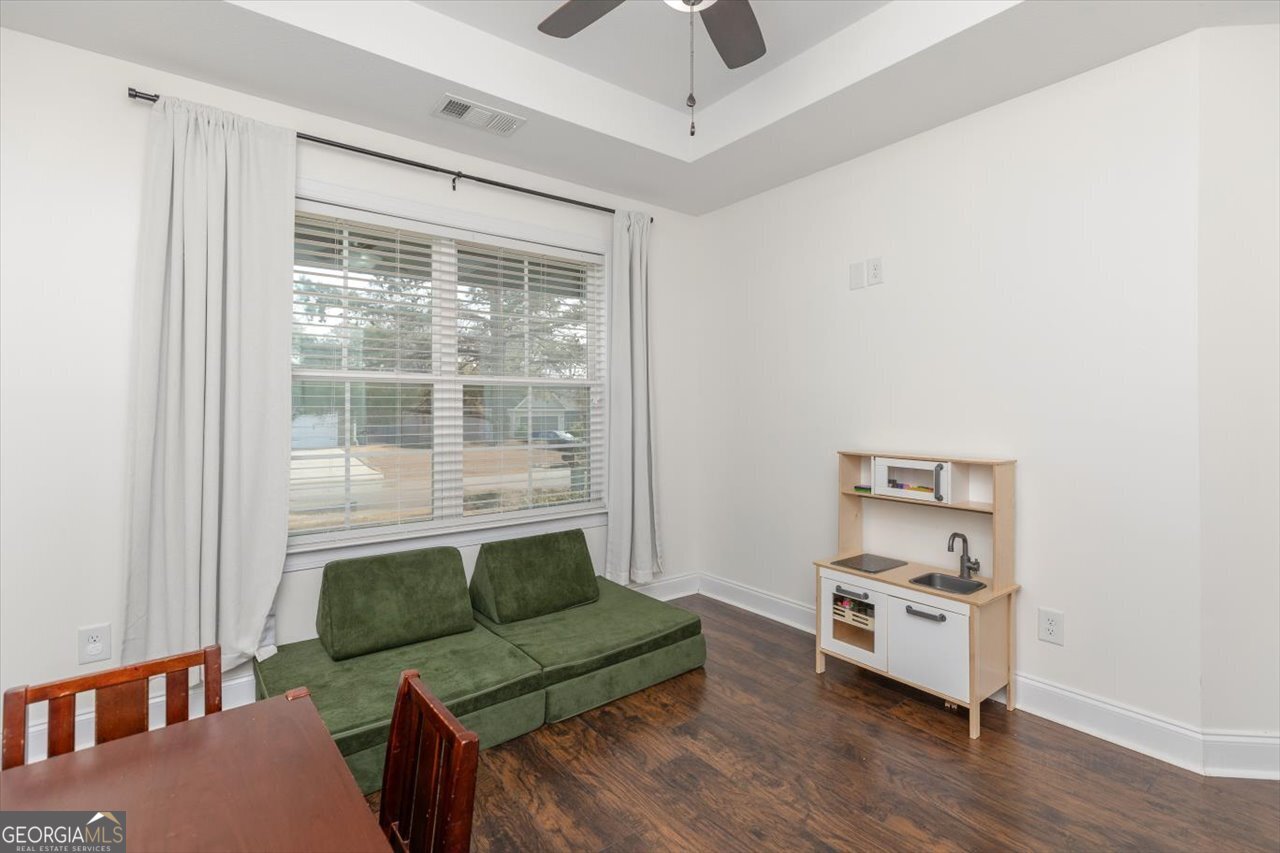 207 Kendall Court Perry, GA 31069 - Photo 31 of 45 a living room with furniture and a window