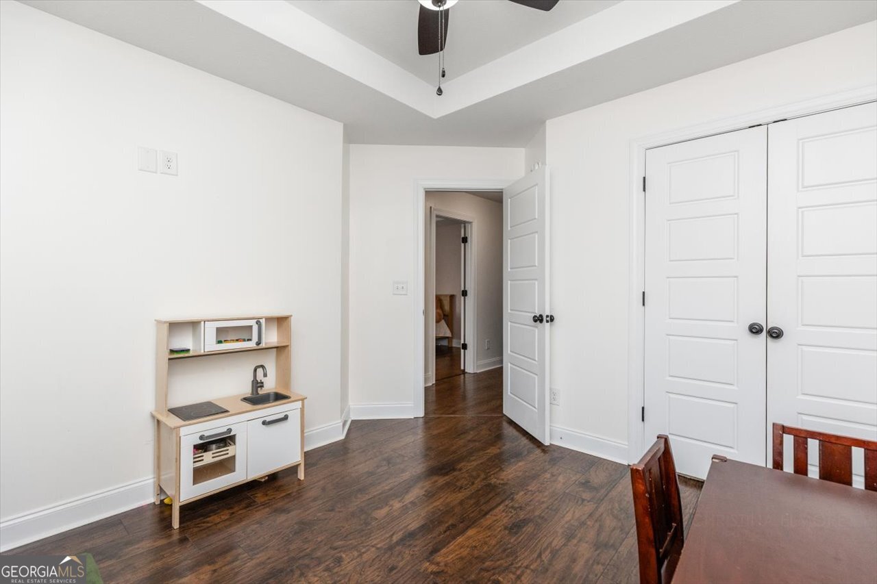 207 Kendall Court Perry, GA 31069 - Photo 32 of 45 a room with furniture and wooden floor