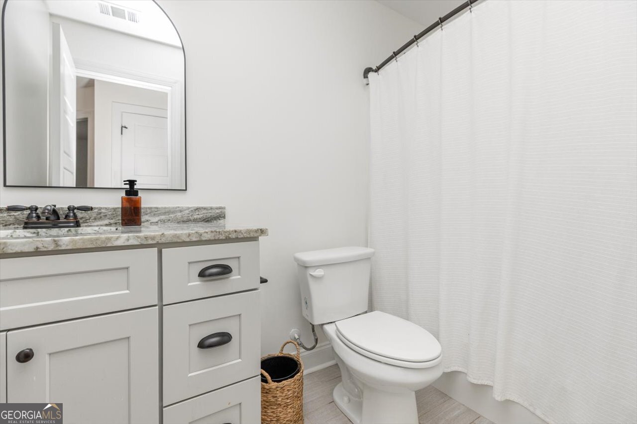 207 Kendall Court Perry, GA 31069 - Photo 36 of 45 a bathroom with a sink and a toilet